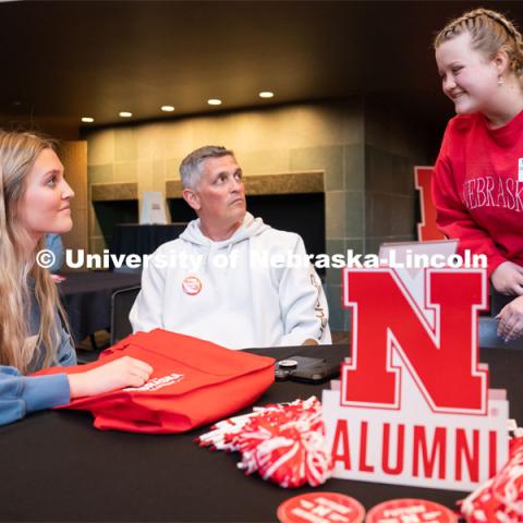 University of Nebraska student representatives speak with out-of-state students and their families during student admission’s National Tailgate at the Wick Alumni Center. Admitted Student Day is UNL’s in-person, on-campus event for all admitted students. March 24, 2023. Photo by Jordan Opp for University Communication.