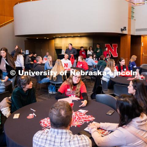 University of Nebraska student representatives speak with out-of-state students and their families during student admission’s National Tailgate at the Wick Alumni Center. Admitted Student Day is UNL’s in-person, on-campus event for all admitted students. March 24, 2023. Photo by Jordan Opp for University Communication.