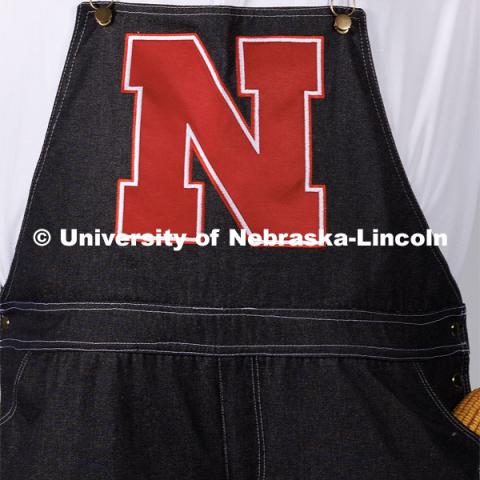 Closeup of Herbie's overalls with the big red N for Nebraska. New Herbie photoshoot. April 7, 2023. Photo by Craig Chandler / University Communication.