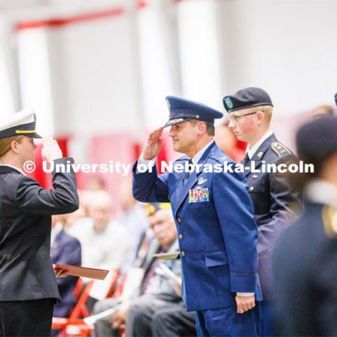 Colonel (Ret.) Joe Brownell presents an award at the ROTC Joint Service Chancellor’s Review. April 27, 2023. Photo by Craig Chandler / University Communication.