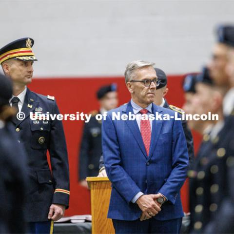 Chancellor Ronnie Green, center, along with Lieutenant Colonel Mark Peer. watch as the troops pass at the ROTC Joint Service Chancellor’s Review in Cook Pavilion. April 27, 2023. Photo by Craig Chandler / University Communication.