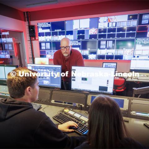 Technical Director Jamie Wenz talks over the challenges of the rehearsal before the nightly newscast. Students produce their Nebraska Nightly telecast in the new Don and Lorena Meier Studio. April 28, 2023. Photo by Craig Chandler / University Communication.