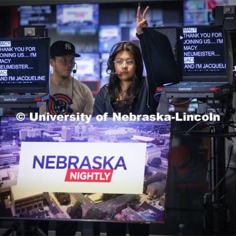 Emily Ortiz-Cantu counts down the seconds until Nebraska Nightly takes the air. Students produce their Nebraska Nightly telecast in the new Don and Lorena Meier Studio. April 28, 2023. Photo by Craig Chandler / University Communication.