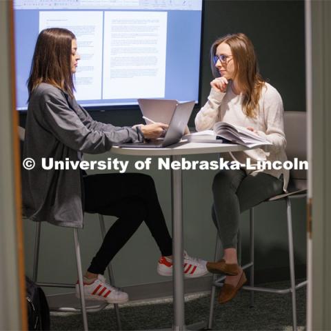 Students study together in a study room. College of Law photo shoot. April 28, 2023. Photo by Craig Chandler / University Communication.