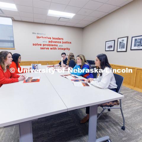 Students study together in a study room. College of Law photo shoot. April 28, 2023. Photo by Craig Chandler / University Communication.