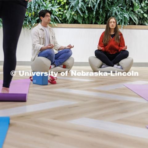 Students practicing yoga. College of Law photo shoot. April 28, 2023. Photo by Craig Chandler / University Communication.