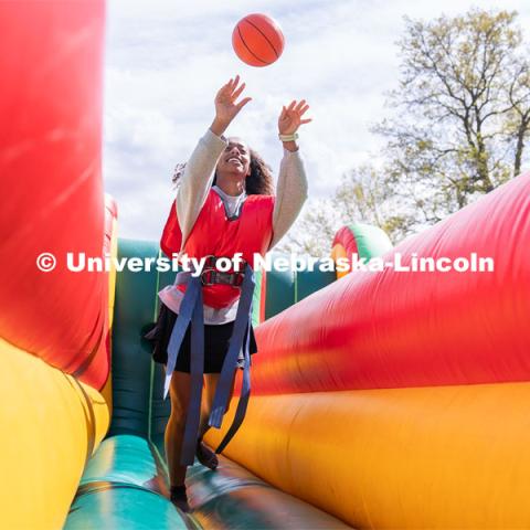 Sophomore Biochemical Pre-Vet major Yasmin Worth shoots a ball at the 2023 End of Year Bash at East Campus Mall. April 29, 2023. Photo by Jordan Opp for University Communication.