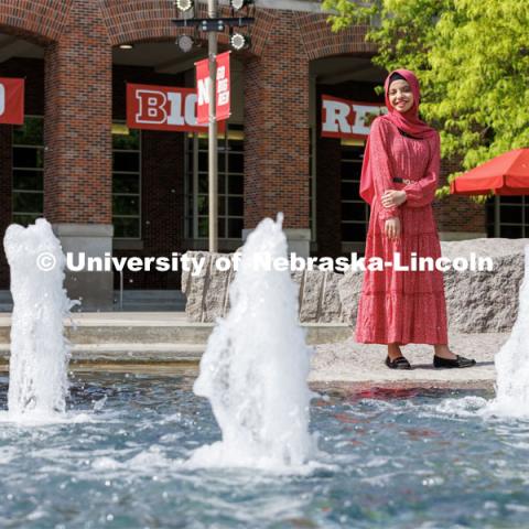 Sukaina Al-Hamedi, Husker Dialogue speaker is photographed outside the Nebraska Union by the Broyhill Fountain. May 10, 2023. Photo by Craig Chandler / University Communication.