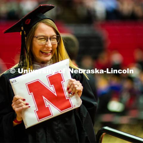 Christa Rahl smiles after receiving her master’s degree. 2023 Spring Graduate Commencement in Bob Devaney Sports Center. May 19, 2023. Photo by Justin Mohling for University Communication.