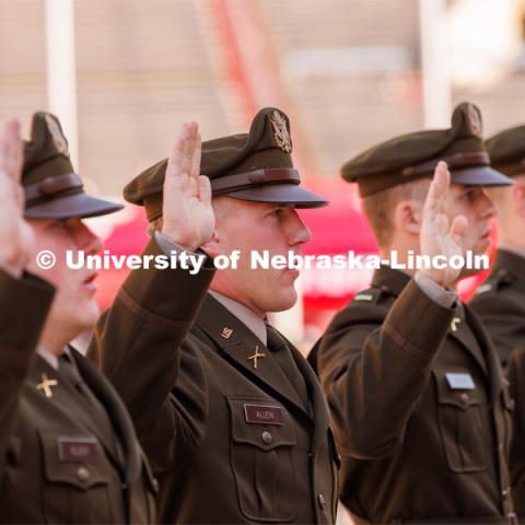 ROTC students in the Army, Air Force and Navy ROTC programs at UNL take their oath of office at the beginning of the ceremony. Undergraduate commencement at Memorial Stadium. May 20, 2023. Photo by Craig Chandler / University Communication.