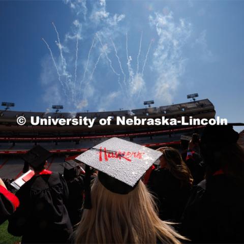 Ashtyn Tridle watches the fireworks at the conclusion of commencement. Undergraduate commencement at Memorial Stadium. May 20, 2023. Photo by Craig Chandler / University Communication.