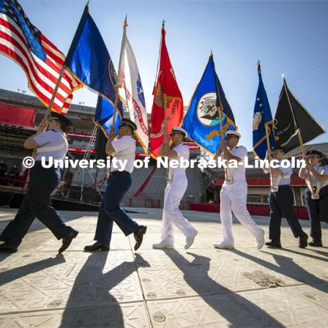 UNL ROTC color guard brings in the colors to begin the ceremony. Undergraduate commencement at Memorial Stadium. May 20, 2023. Photo by Dillon Galloway for University Communications.
