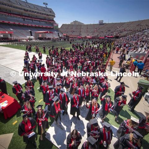 New Husker graduates leave Memorial Stadium. Undergraduate commencement at Memorial Stadium. May 20, 2023. Photo by Dillon Galloway for University Communications.