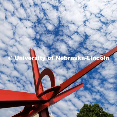 Old Glory sculpture against the morning sky. City Campus. June 2, 2023. Photo by Craig Chandler / University Communication. 