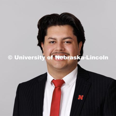 Studio portrait of Miguel Avila, Recruitment Specialists, Office of Admissions. June 7, 2023. Photo by Craig Chandler / University Communication.