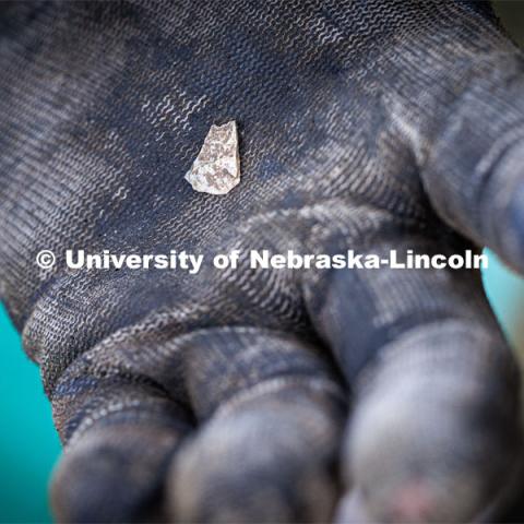 A shard found at the Reller Prairie site. LuAnn Wandsnider is leading anthropology and forensic anthropology digs at the Reller Prairie in southwest Lancaster County. June 9, 2023. Photo by Craig Chandler / University Communication.