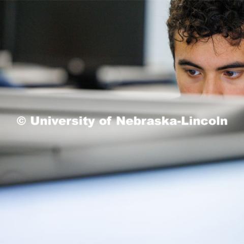 Santiago Zuniga from Florida Southern University works on the research. Students in Research Experiences for Undergraduates summer program are working to study how various marginalized groups in American history used the law to contest and advance their rights. June 14, 2023. Photo by Craig Chandler / University Communication.