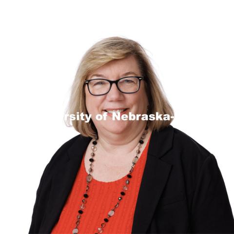 Studio portrait of Alisa Smith, Director of Advising, College of Journalism and Mass Communications. July 10, 2023. Photo by Craig Chandler / University Communication.