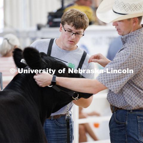 Braeden Humphreys of Wymore listens to showmanship tips from the judge during the senior division beef showmanship competition. 4H/FFA Beef Show at the Gage County Fair and Expo in Beatrice. July 28, 2023. Photo by Craig Chandler / University Communication.