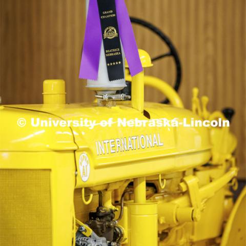 A yellow International tractor wins a purple ribbon at the 4H/FFA Beef Show at the Gage County Fair and Expo in Beatrice. July 28, 2023. Photo by Craig Chandler / University Communication.