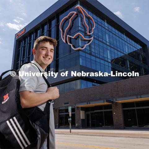 Jack Kinney of Omaha was one of the first Huskers to declare the new interdisciplinary business and law major. Only offered by a handful of business schools, the new major addresses a critical shortage of mid- and upper-level managers with legal knowledge. Kinney is pictured in front of Hudl a business in Lincoln’s Haymarket downtown. August 12, 2023. Photo by Craig Chandler / University Communication and Marketing.