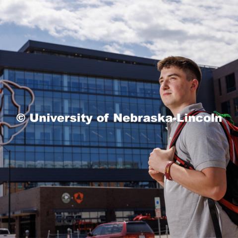 Jack Kinney of Omaha was one of the first Huskers to declare the new interdisciplinary business and law major. Only offered by a handful of business schools, the new major addresses a critical shortage of mid- and upper-level managers with legal knowledge. Kinney is pictured in front of Hudl a business in Lincoln’s Haymarket downtown. August 12, 2023. Photo by Craig Chandler / University Communication and Marketing.