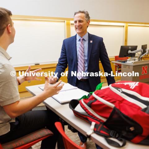 Jack Kinney of Omaha with Richard Moberly, dean of the College of Law, was one of the first Huskers to declare the new interdisciplinary business and law major. Only offered by a handful of business schools, the new major addresses a critical shortage of mid- and upper-level managers with legal knowledge. Kinney and Dean Moberly are pictured in a Hawks Hall classroom. August 12, 2023. Photo by Craig Chandler / University Communication and Marketing.