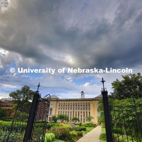 Dark clouds above Love Library and the Love gardens. August 13, 2023. Photo by Craig Chandler/ University Communication.