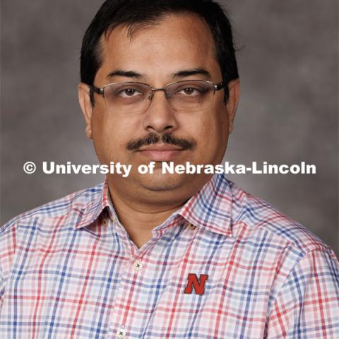Studio portrait of Sanjay Chaudhuri, Associate Professor of Statistics. 2023 New Faculty Orientation. August 16, 2023. Photo by Craig Chandler / University Communication.