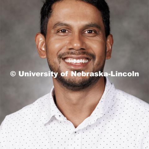 Studio portrait of Dixon Vimalajeewa, Assistant Professor of Statistics. 2023 New Faculty Orientation. August 16, 2023. Photo by Craig Chandler / University Communication.