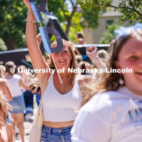 Kappa Delta sorority members celebrate after receiving their bid Saturday afternoon. Sorority Bid Day in the Cather Dining Complex and on the Vine Street Fields. August 19, 2023. Photo by Craig Chandler / University Communication.