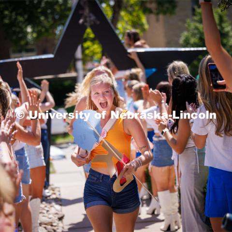 Kappa Delta sorority members celebrate after receiving their bid Saturday afternoon. Sorority Bid Day in the Cather Dining Complex and on the Vine Street Fields. August 19, 2023. Photo by Craig Chandler / University Communication.