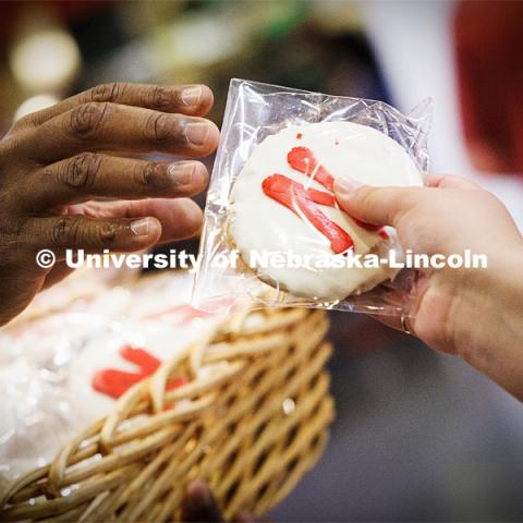 Chancellor Rodney Bennett passes out cookies and chats with students at Nebraska Union. First day of classes for fall semester. First day of fall semester. August 21, 2023 Photo by Craig Chandler / University Communication. 