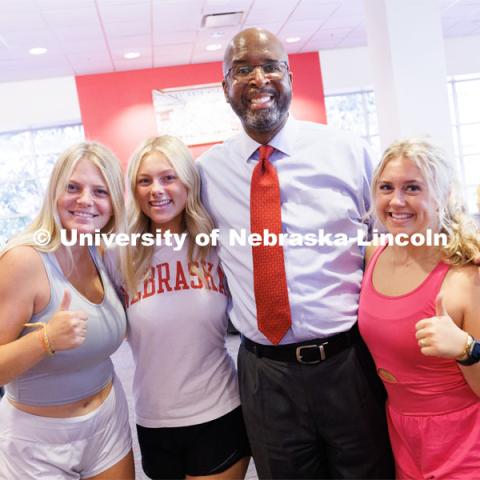 Chancellor Rodney Bennett poses for photos with students during the chancellor’s cookie give-away Monday morning. First day of classes for fall semester. August 21, 2023. Photo by Craig Chandler / University Communication.