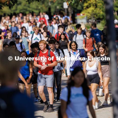 Its a hot and humid day as students cross campus to get to classes on the first day of classes for fall semester. August 21, 2023 Photo by Craig Chandler / University Communication. 