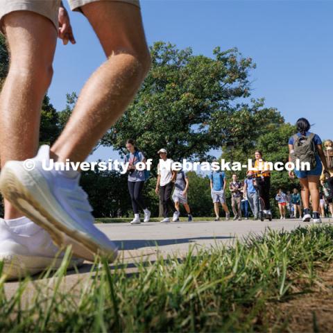 Students pass between classes on city campus. August 29, 2023. Photo by Craig Chandler/ University Communication.