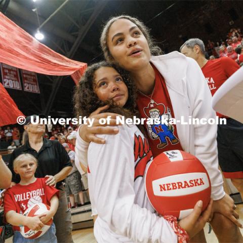 Bekka Allick hugs Neveah Kehr, 10, from Bismarck, North Dakota, after Neveah and another young girl were selected to read their hand-written notes to the Nebraska Volleyball team. Bekka is Neveah’s favorite player. Rally at the Coliseum. Volleyball Day in Nebraska. Husker Nation stole the show on Volleyball Day in Nebraska. The announced crowd of 92,003 surpassed the previous world record crowd for a women’s sporting event of 91,648 fans at a 2022 soccer match between Barcelona and Wolfsburg. Nebraska also drew the largest crowd in the 100-year history of Memorial Stadium for Wednesday’s match. August 30, 2023. Photo by Craig Chandler / University Communication.