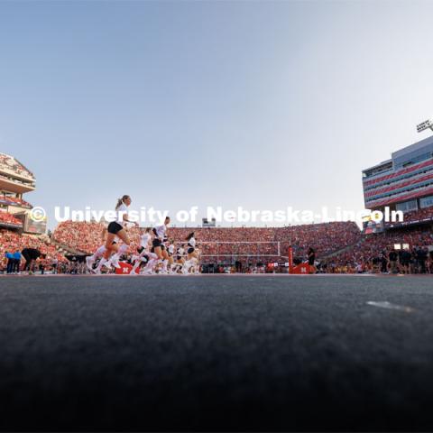 The Husker warm up on the Terry Pettit Court on Tom Osborne Field at Memorial Stadium. Volleyball Day in Nebraska. Husker Nation stole the show on Volleyball Day in Nebraska. The announced crowd of 92,003 surpassed the previous world record crowd for a women’s sporting event of 91,648 fans at a 2022 soccer match between Barcelona and Wolfsburg. Nebraska also drew the largest crowd in the 100-year history of Memorial Stadium for Wednesday’s match. August 30, 2023. Photo by Craig Chandler / University Communication.