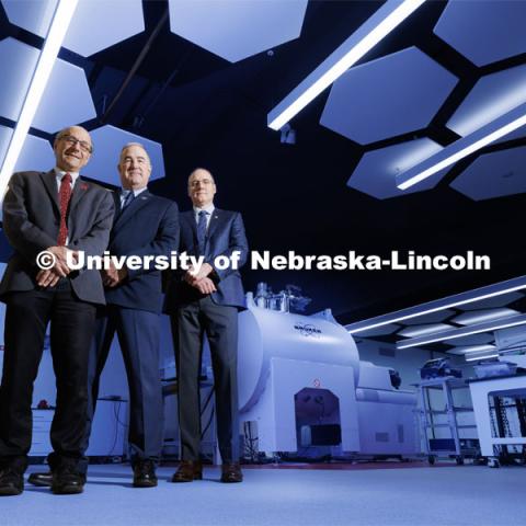 (From left) David Berkowitz of the University of Nebraska–Lincoln, Rick Evans of the National Strategic Research Institute and Ken Bayles of the University of Nebraska Medical Center have received a $24.5 million award from the Defense Health Agency to advance development of an acute radiation syndrome prophylactic. They are shown with UNL’s new 15-Tesla ICR-MS instrument in Hamilton Hall. August 31, 2023. Photo by Craig Chandler / University Communication.