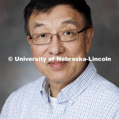 Studio portrait of Joe Zhou, Research Professor, Center for Biotechnology. September 14, 2023. Photo by Craig Chandler / University Communication.