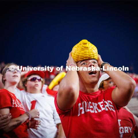 Dillon Parker, a freshman from California, cheers on the Huskers. Northern Illinois football in Memorial Stadium. September 16, 2023. Photo by Craig Chandler / University Communication.