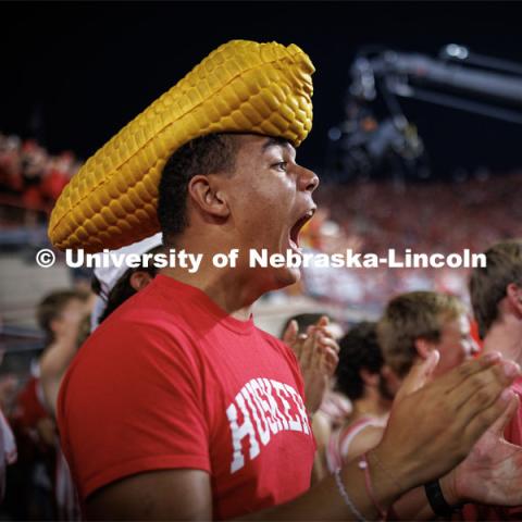 Dillon Parker, a freshman from California, cheers on the Huskers. Northern Illinois football in Memorial Stadium. September 16, 2023. Photo by Craig Chandler / University Communication.