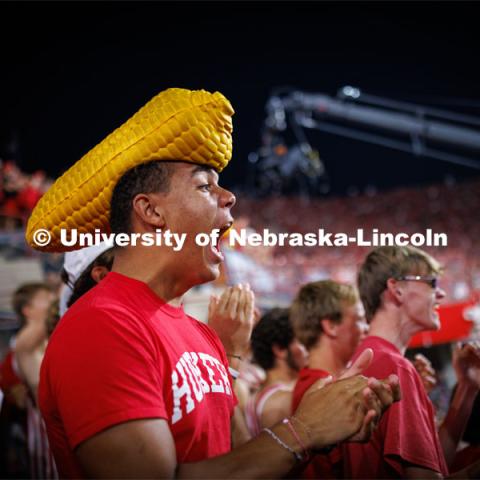 Dillon Parker, a freshman from California, cheers on the Huskers. Northern Illinois football in Memorial Stadium. September 16, 2023. Photo by Craig Chandler / University Communication.