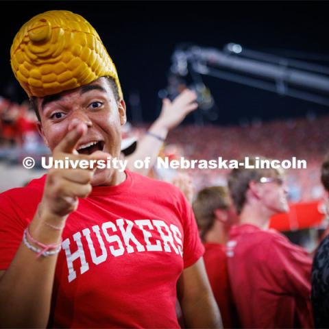 Dillon Parker, a freshman from California, cheers on the Huskers. Northern Illinois football in Memorial Stadium. September 16, 2023. Photo by Craig Chandler / University Communication.