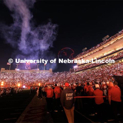 Husker fans light up the night during the light show between the 3rd and 4th quarters. Northern Illinois football in Memorial Stadium. September 16, 2023. Photo by Craig Chandler / University Communication.
