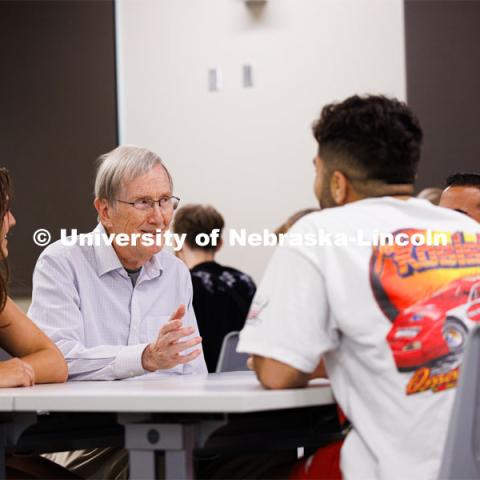 Jim Lewis (second from left), professor emeritus of mathematics, talks with a group of students funded by the STEM CONNECT project. In 2019, Lewis and colleagues received a $3.5 million grant for the project, which helps low-income students pursue degrees in STEM fields. September 19, 2023. Photo by Craig Chandler / University Communication.