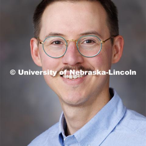 Studio portrait of Andrew Pederson, Assistant Professor, University Libraries. September 19, 2023. Photo by Craig Chandler / University Communication.