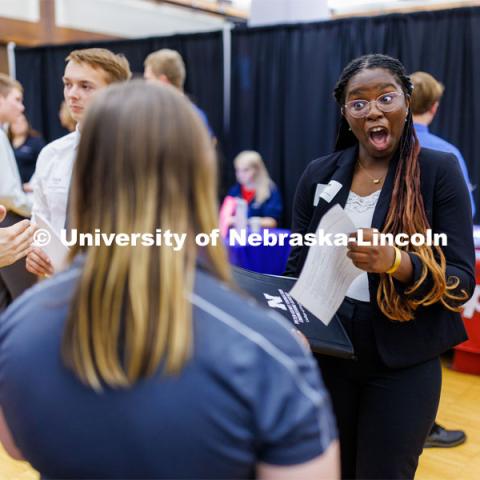 Maryam Sule talks with a recruiter at the Career Fair in the Nebraska Union. September 20, 2023. Photo by Craig Chandler / University Communication.