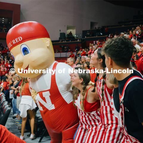 Lil Red helps cheer on the Nebraska volleyball team. Nebraska volleyball fans. September 22, 2023. Photo by Kristen Labadie / University Communication. 