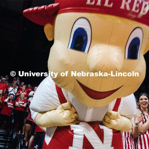 Lil Red helps cheer on the Nebraska volleyball team. Nebraska volleyball fans. September 22, 2023. Photo by Kristen Labadie / University Communication. 